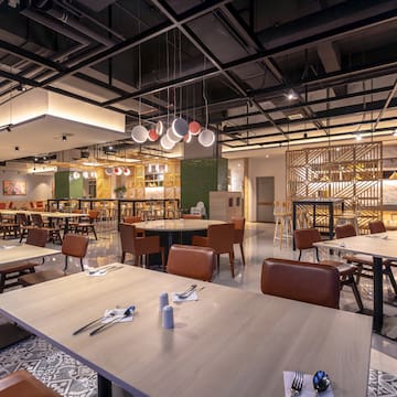 a restaurant with tables and chairs