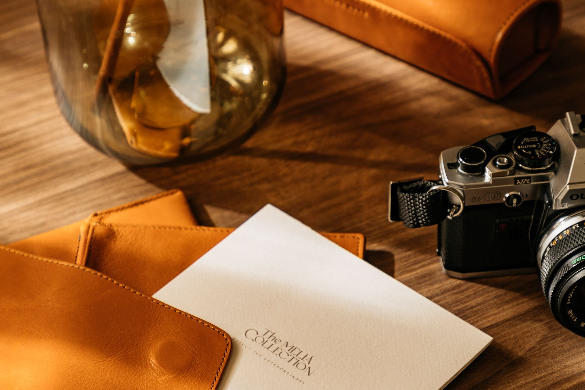 a pencil and a pen on a table