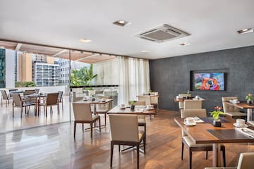 a room with tables and chairs