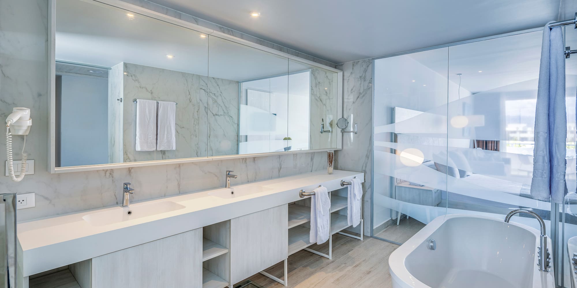 a bathroom with a tub and sink