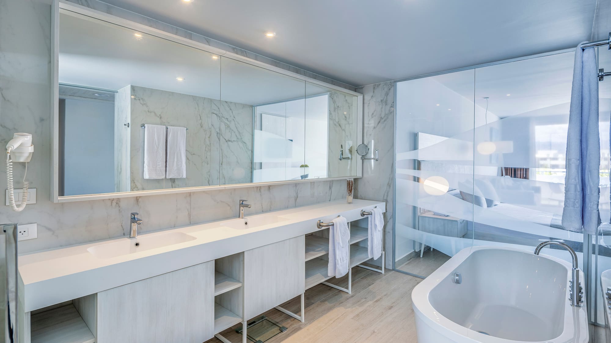 a bathroom with a tub and sink
