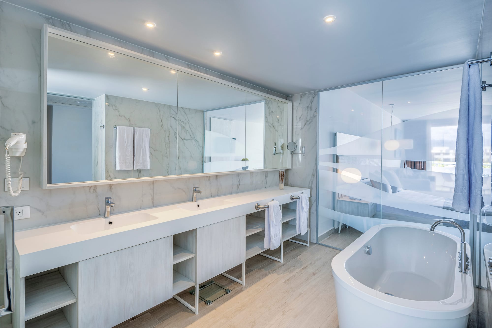a bathroom with a tub and sink