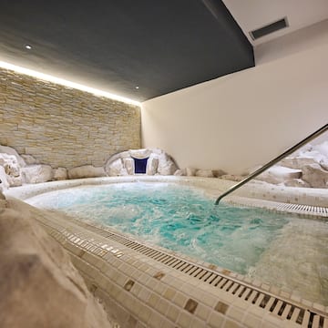 a indoor jacuzzi with a hot tub