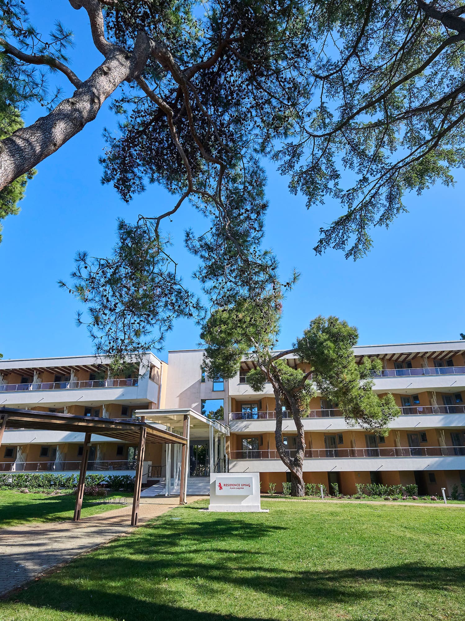 a building with trees in the background