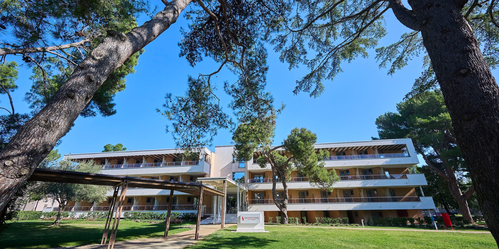 a building with trees in the background