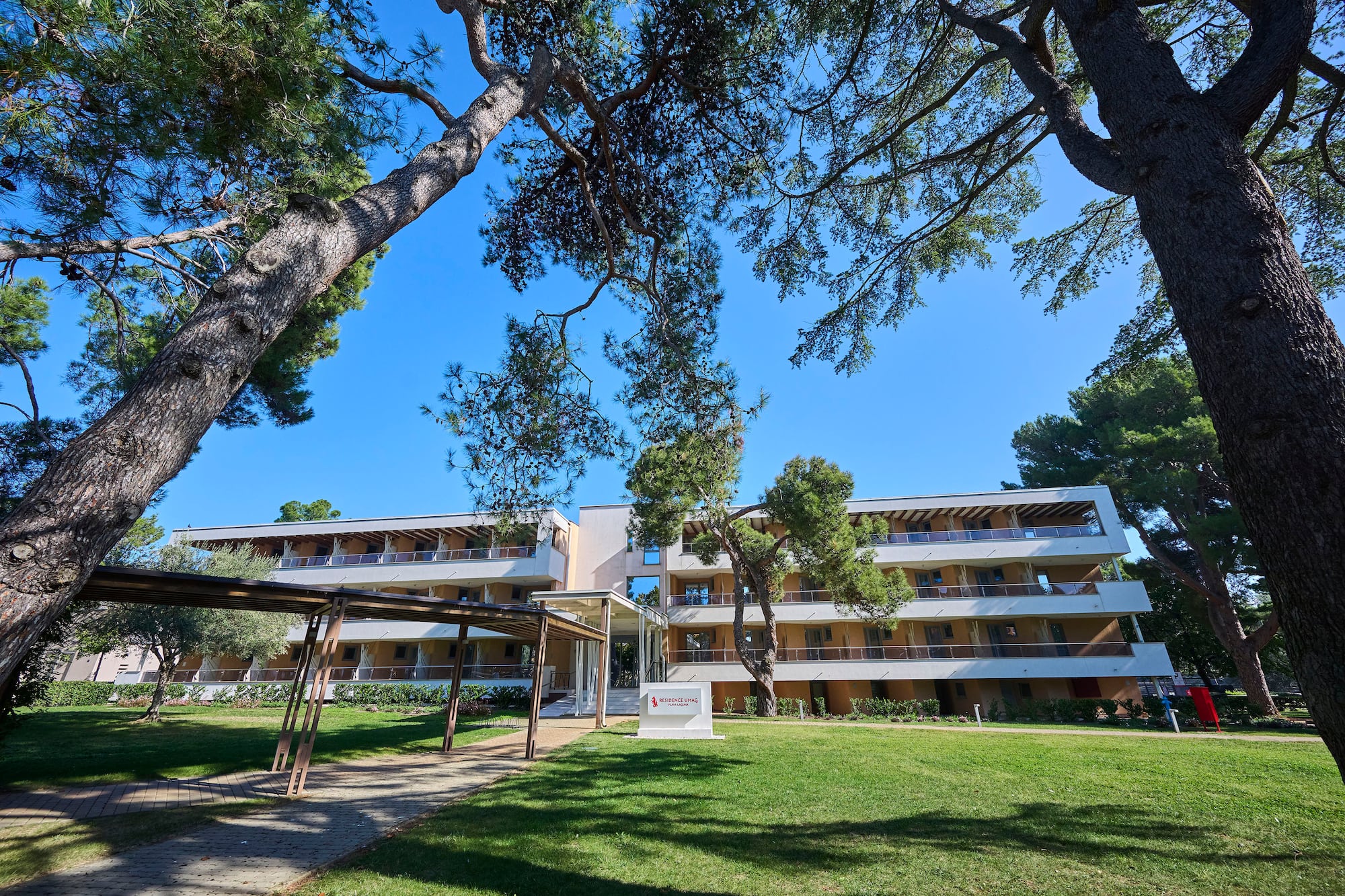 a building with trees in the background