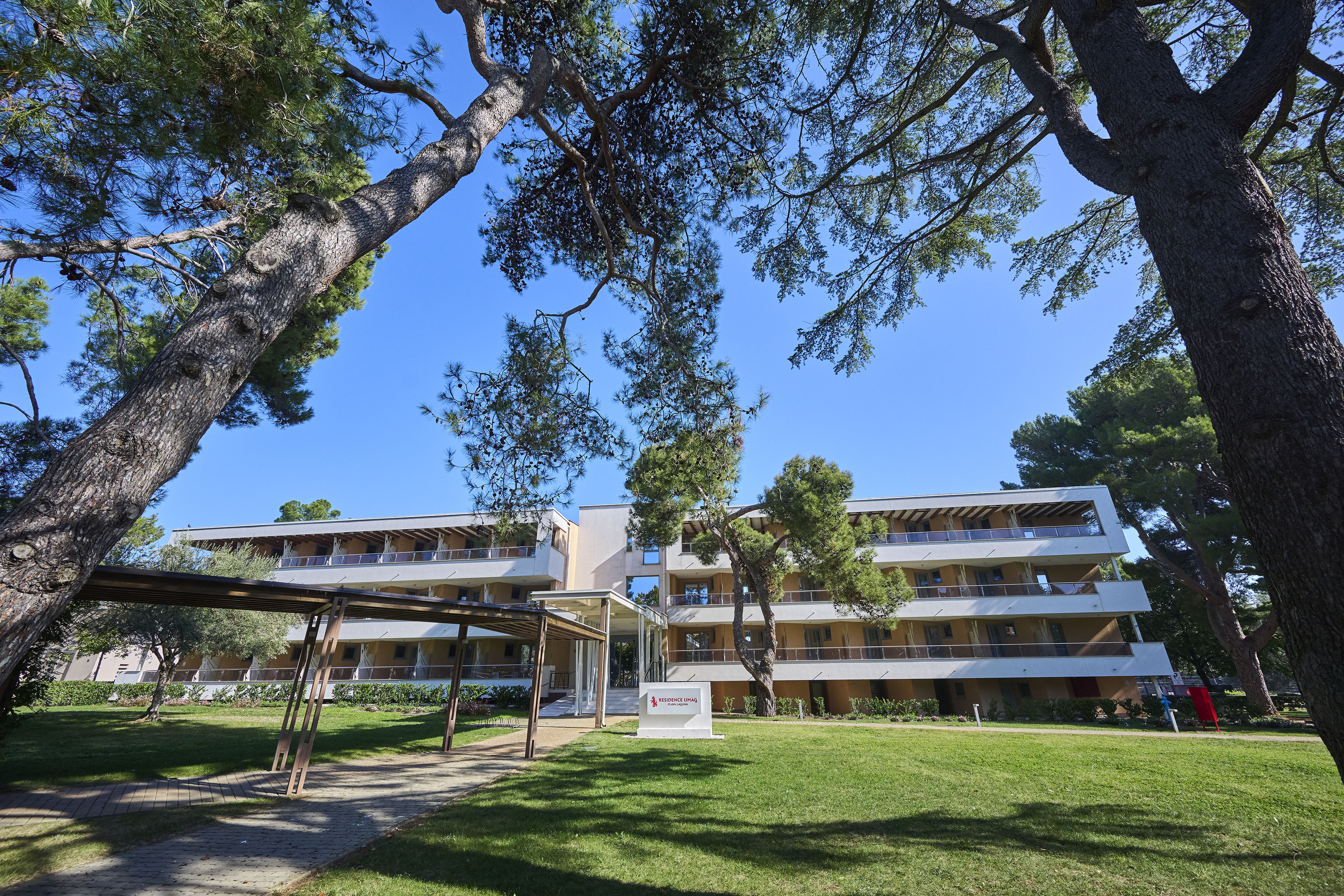a building with trees in the background