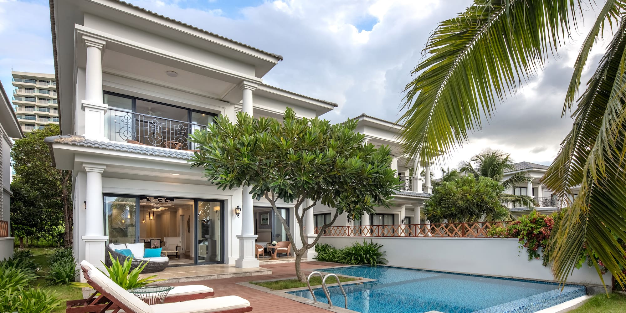 a pool in front of a house