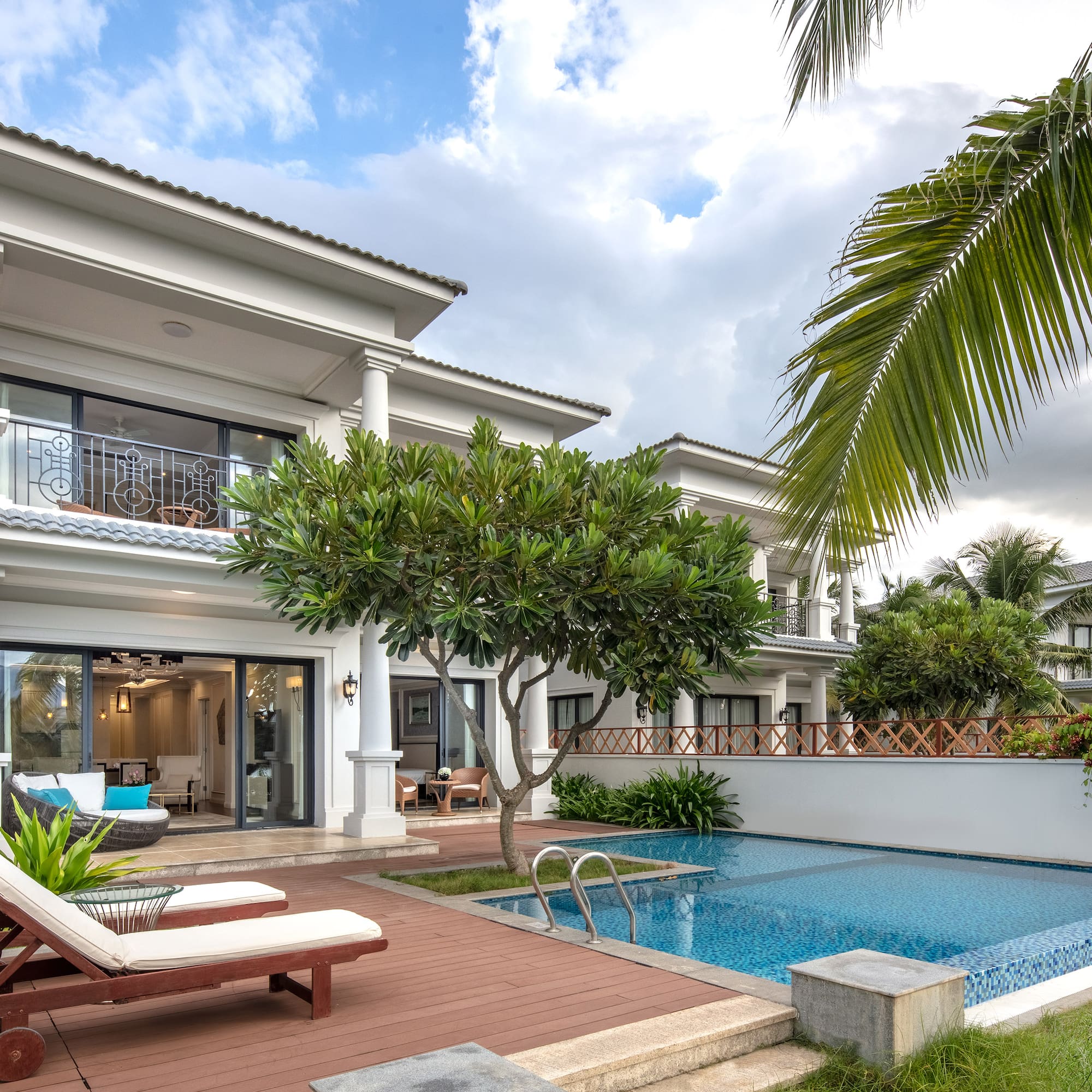 a pool in front of a house
