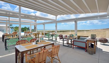 a restaurant with tables and chairs