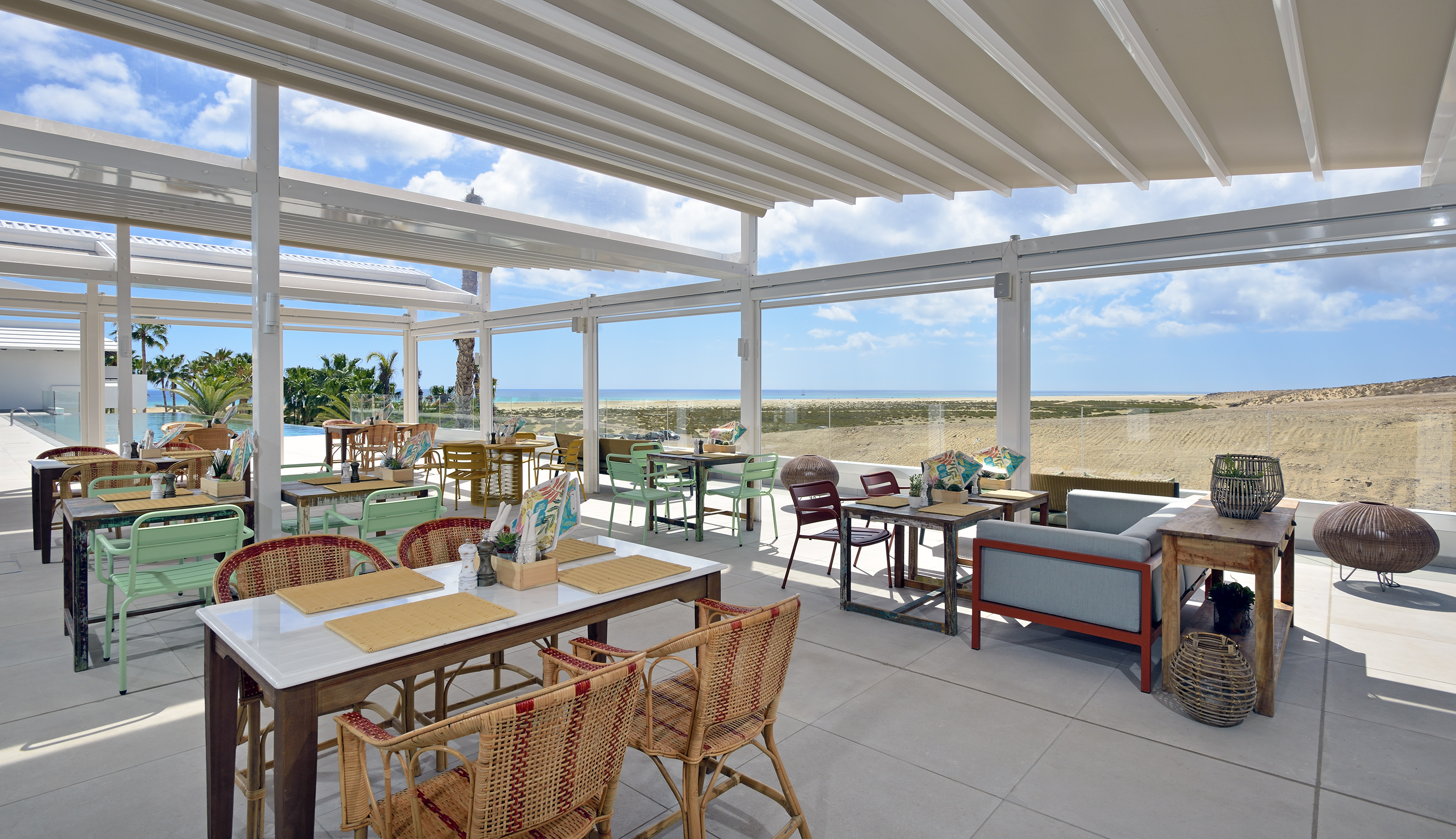 a restaurant with tables and chairs
