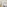 Modern hotel bedroom with large bed, TV, wooden desk, and balcony ocean view.
