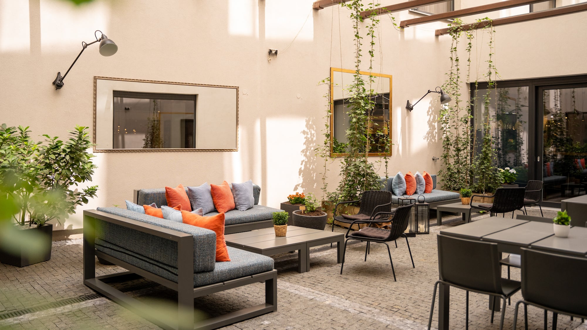 a patio with chairs and tables