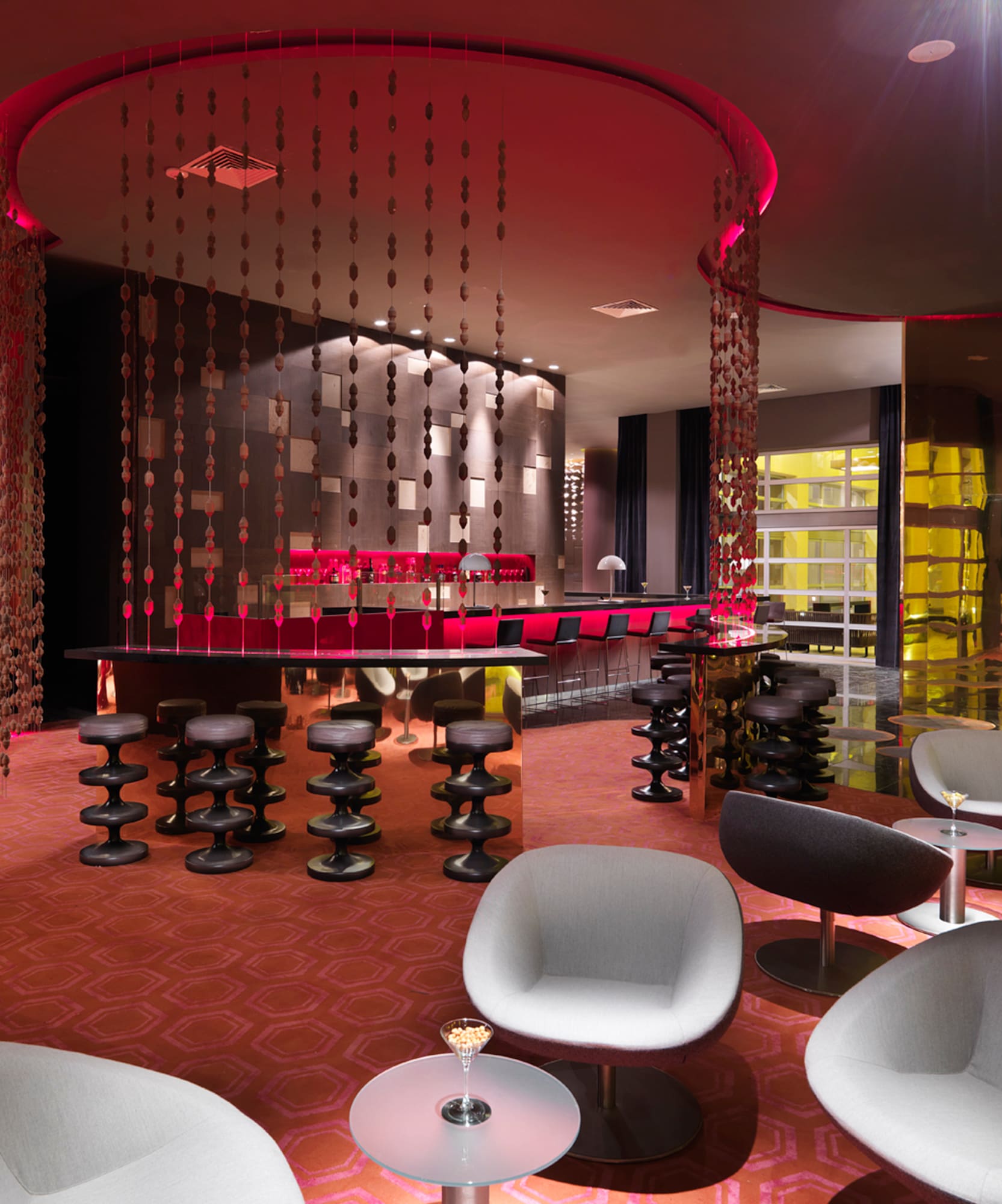 a room with chairs and tables