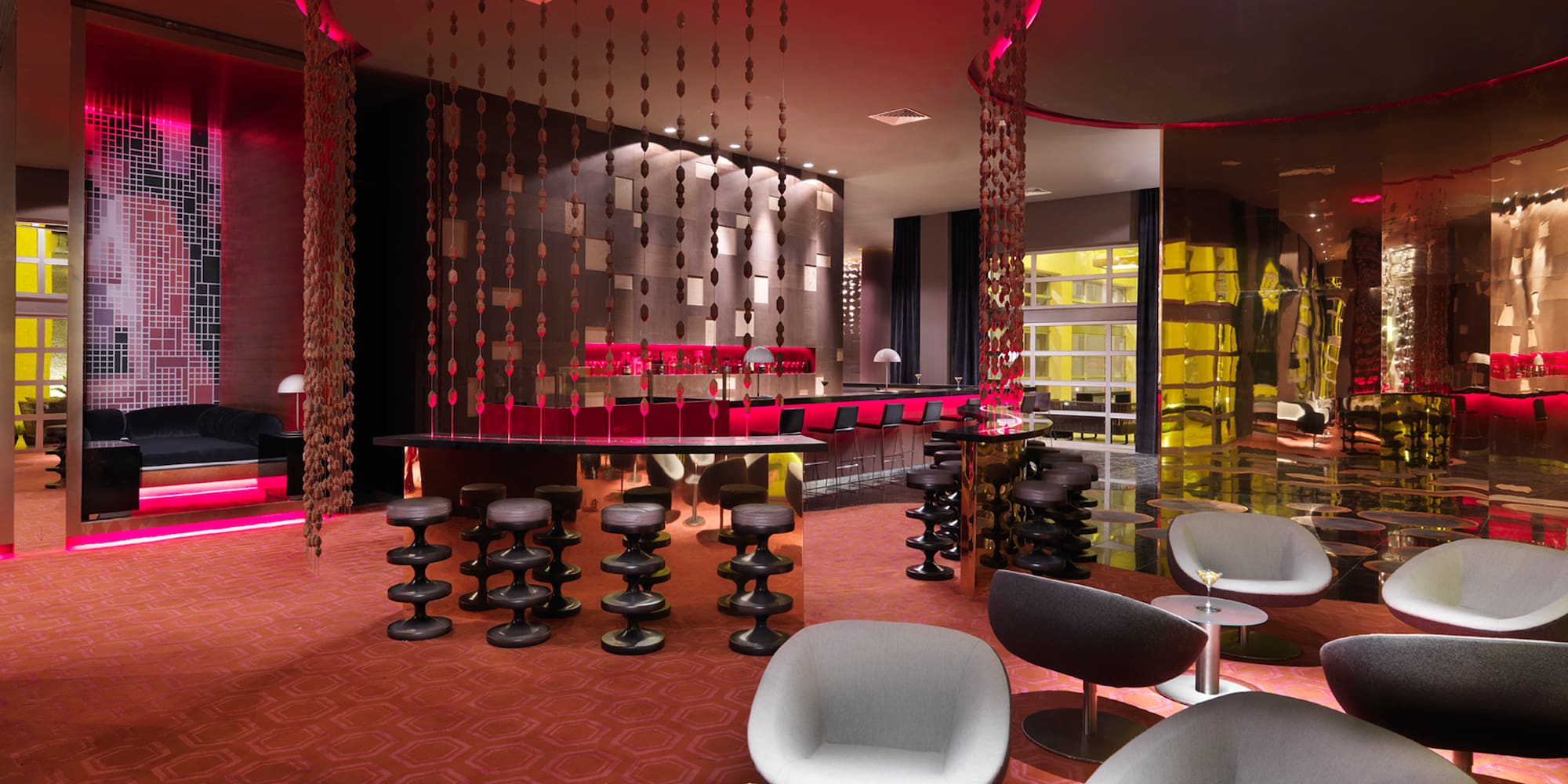 a room with chairs and tables