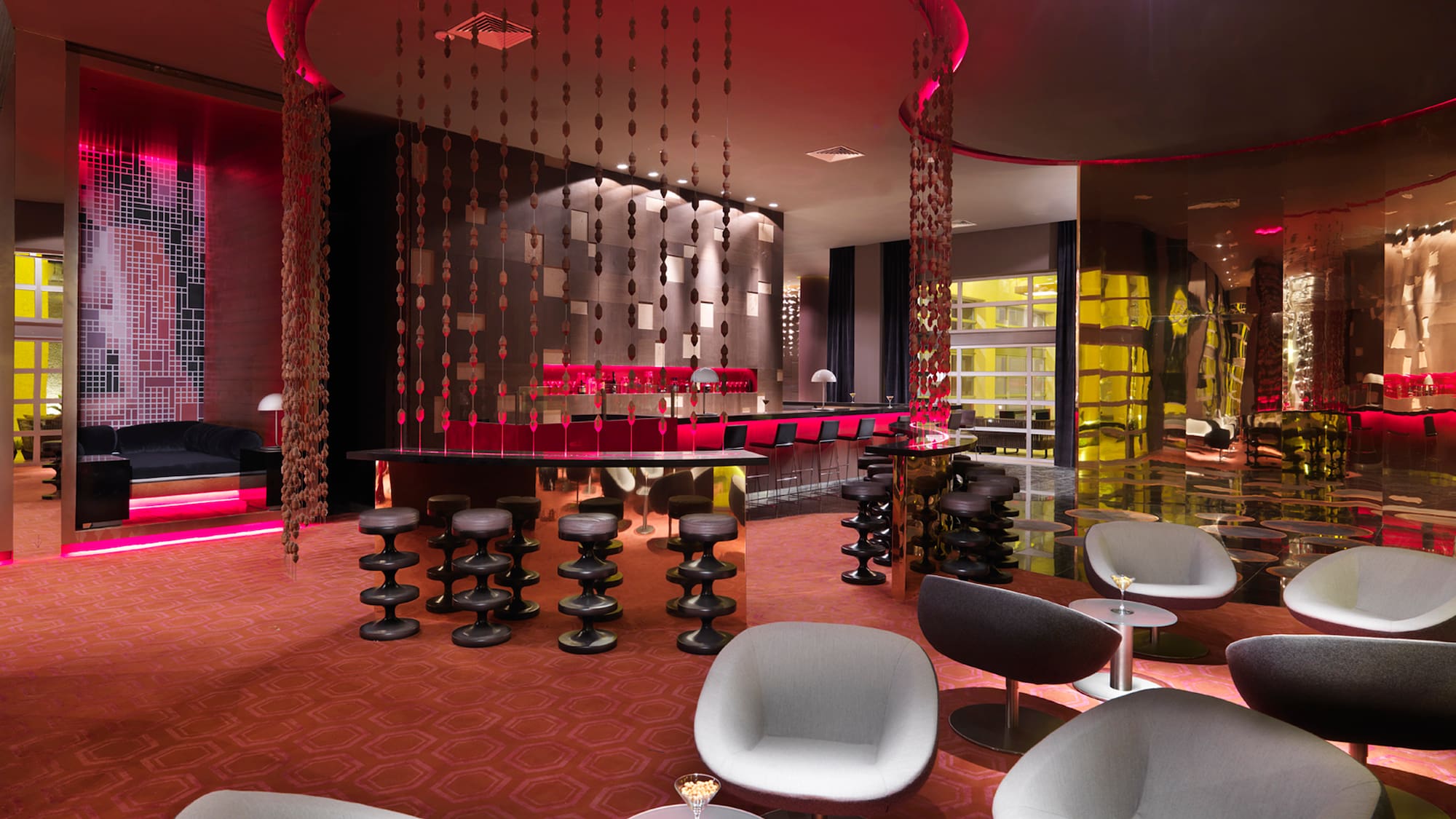 a room with chairs and tables