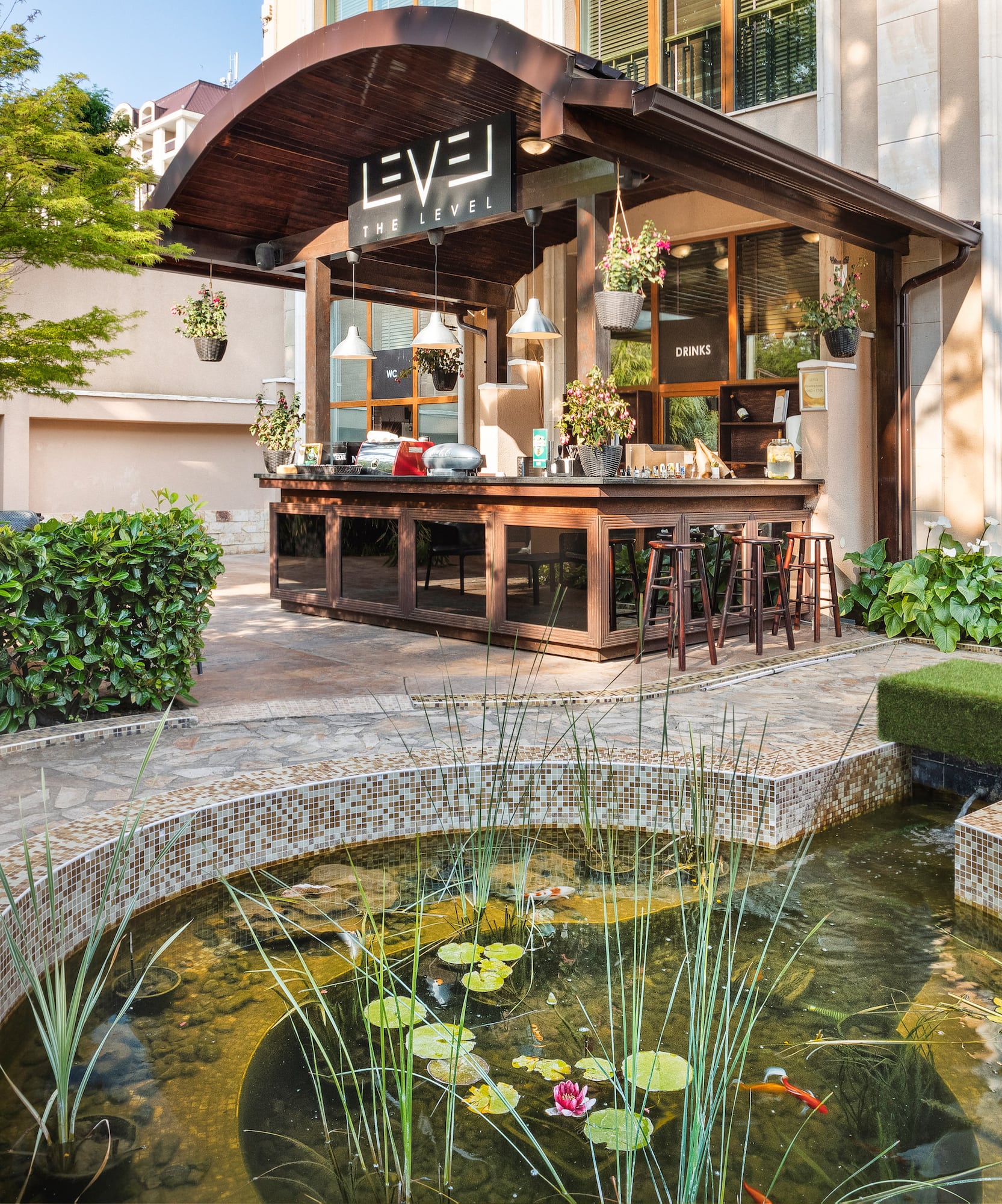 a pond in front of a building