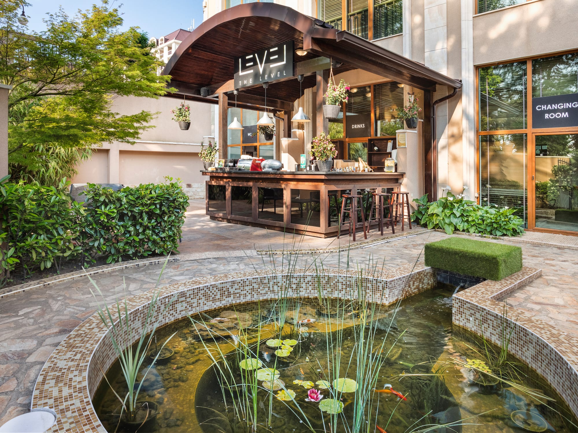 a pond in front of a building