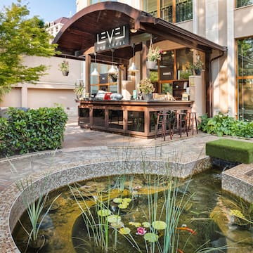 a pond in front of a building