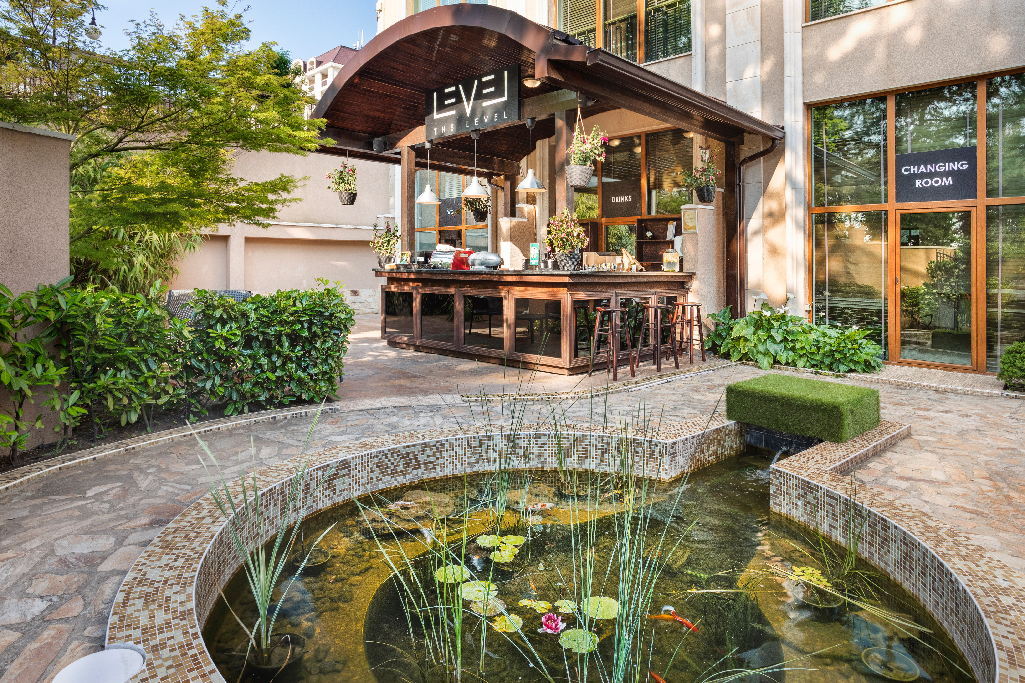 a pond in front of a building