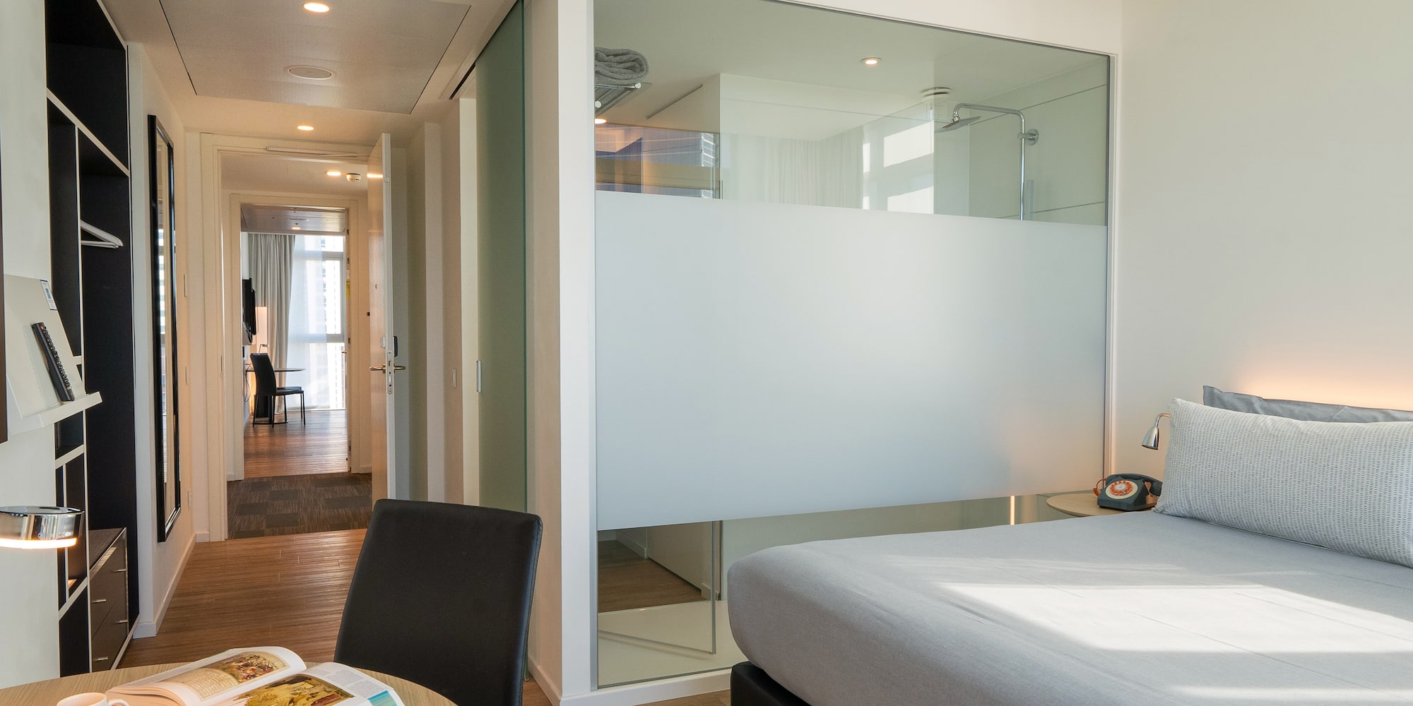 a room with a bed and a table