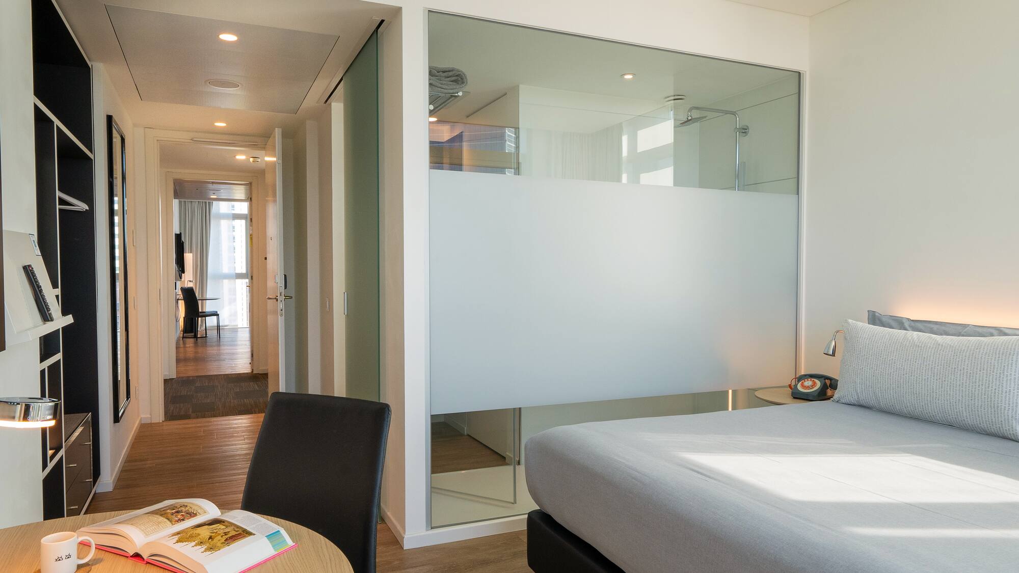 a room with a bed and a table