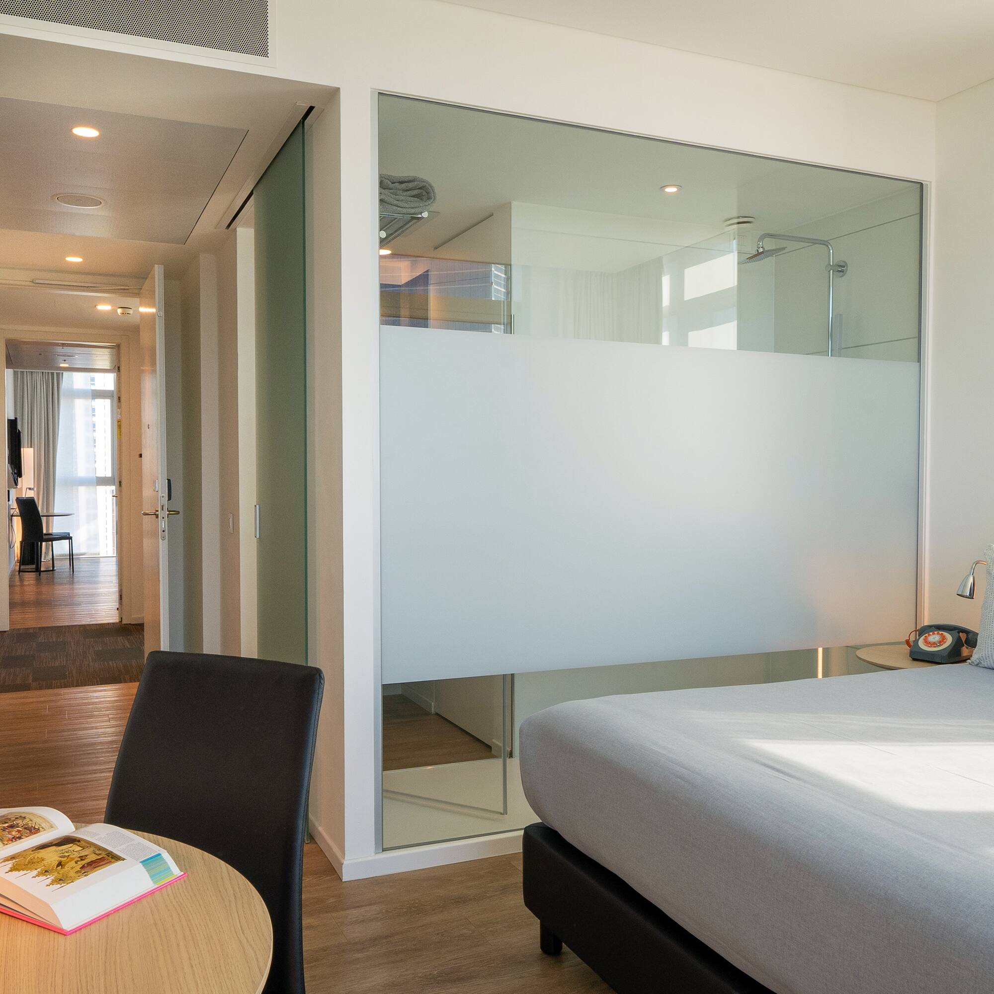 a room with a bed and a table