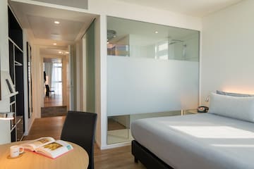 a room with a bed and a table