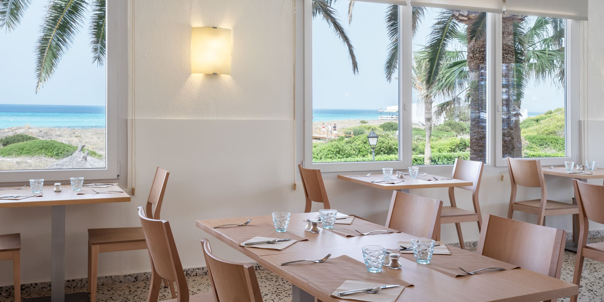 a room with tables and chairs