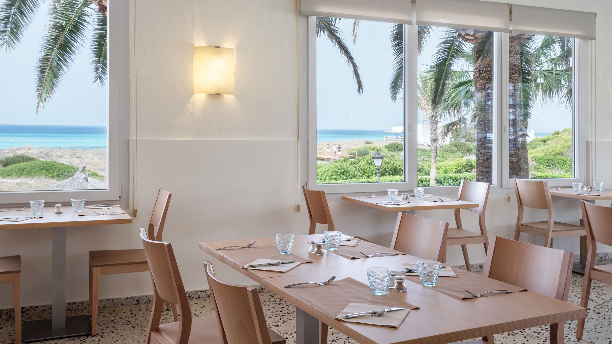 a room with tables and chairs