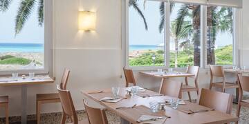 a room with tables and chairs