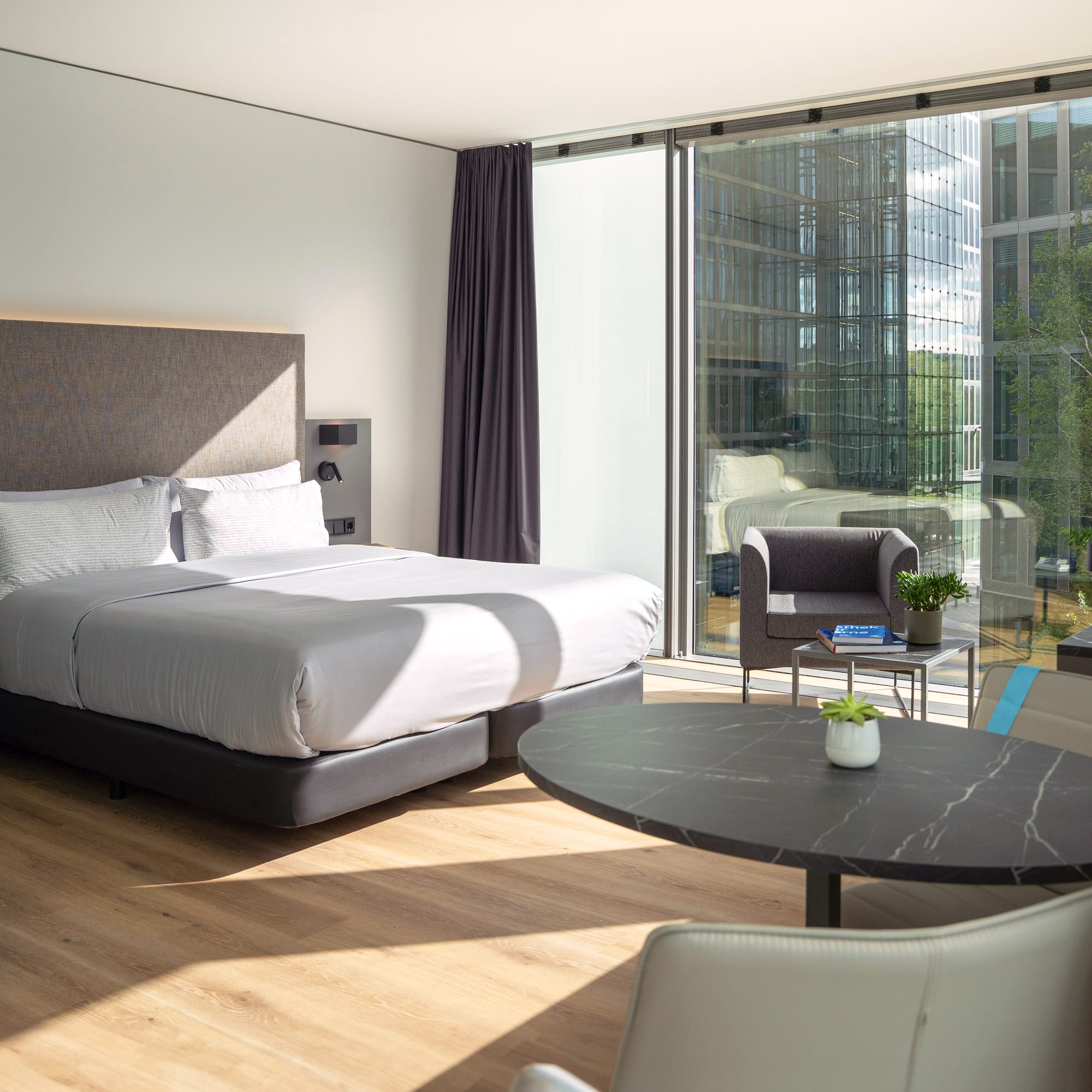 a room with a bed and a table