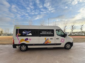 a white van with colorful graphics on it