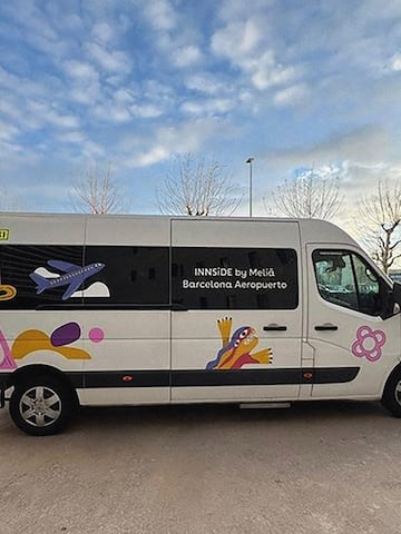 a white van with colorful graphics on it