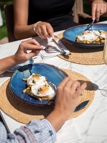 a group of people eating at a table