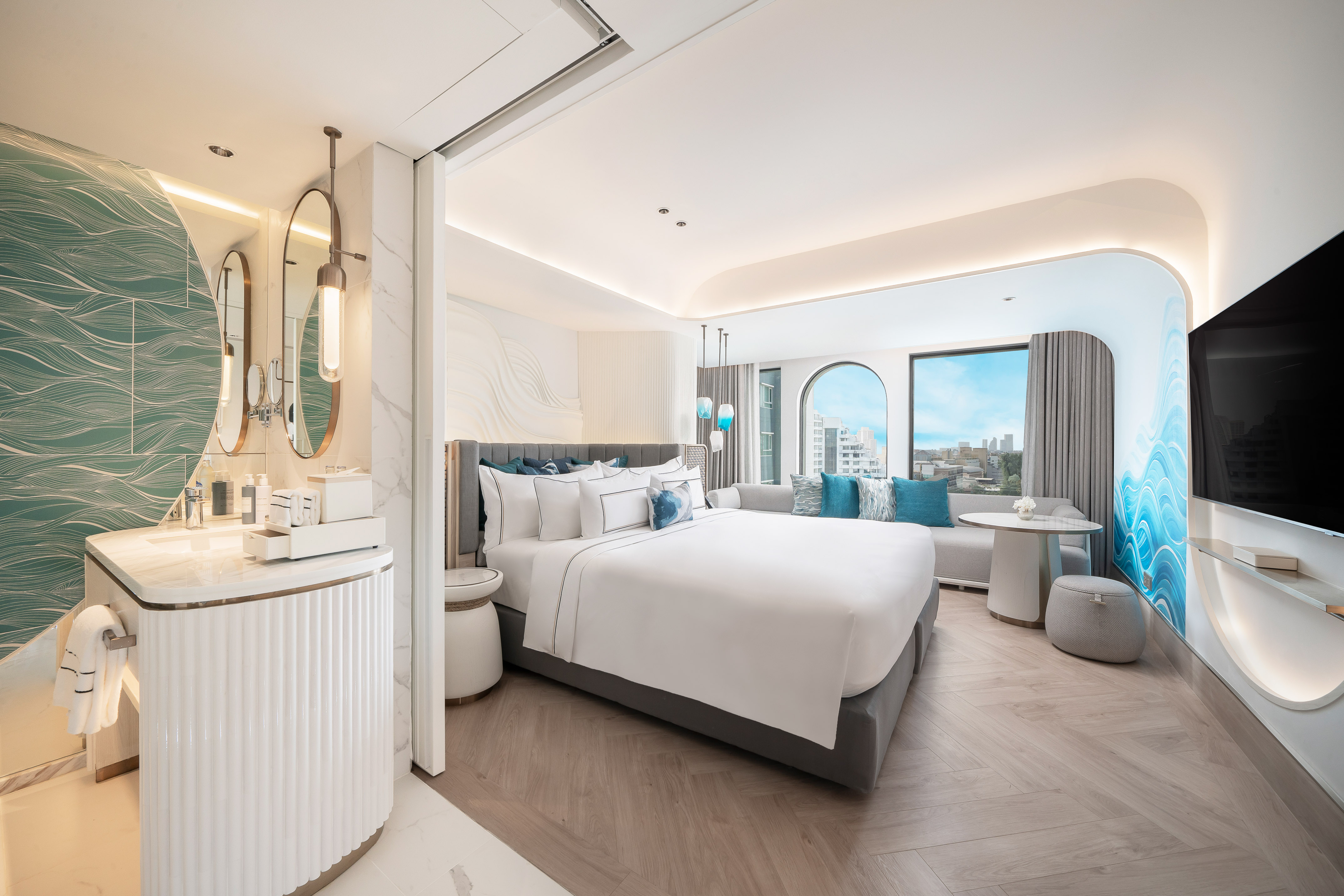 a room with a bed and a mirror