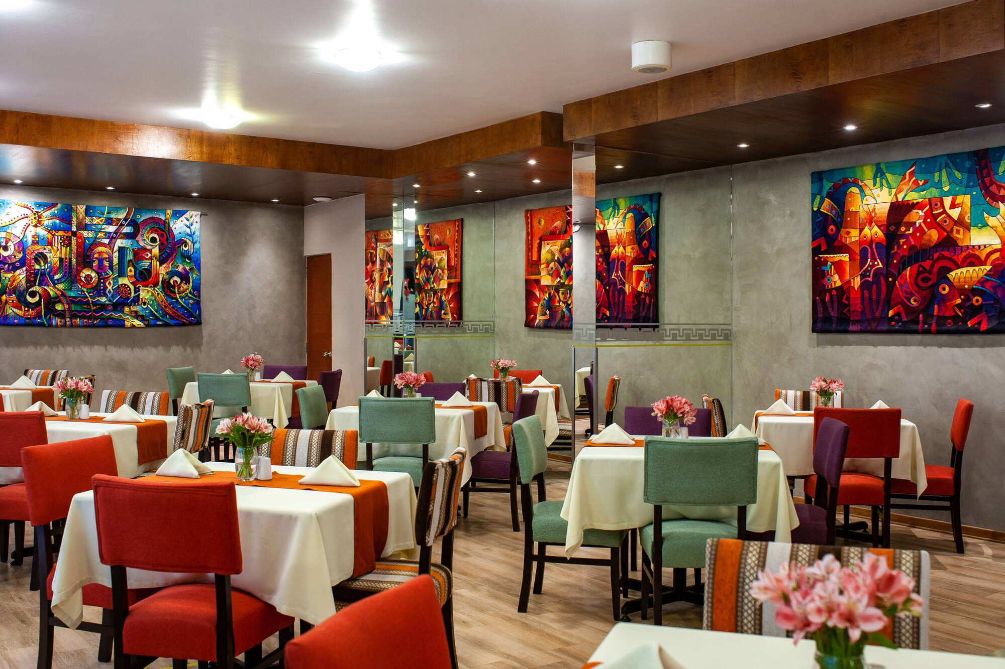 a room with tables and chairs