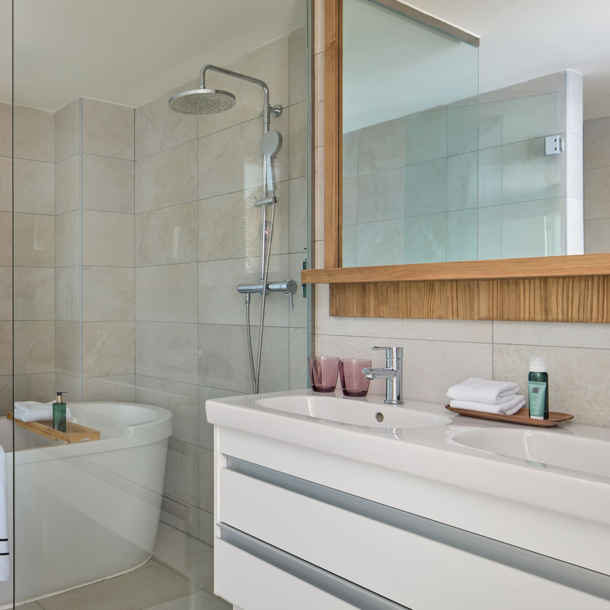 a bathroom with a shower and sink