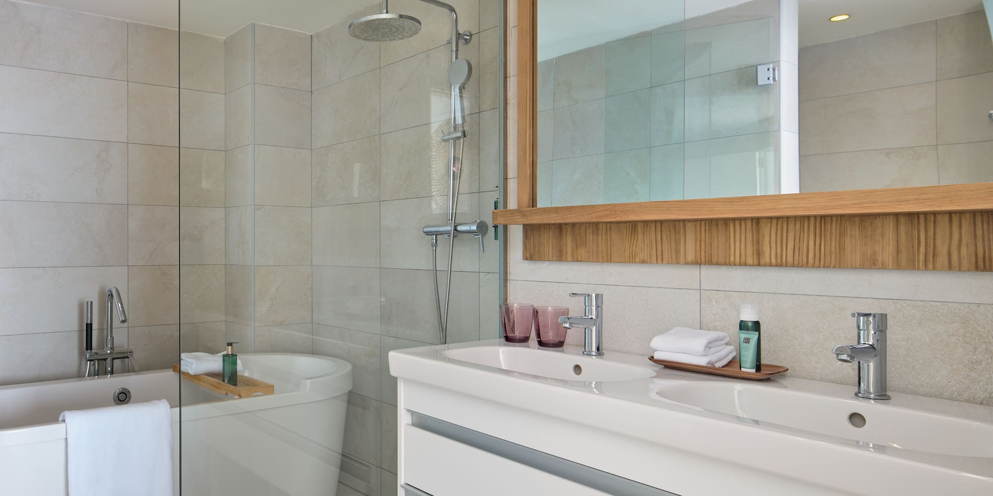 a bathroom with a shower and sink