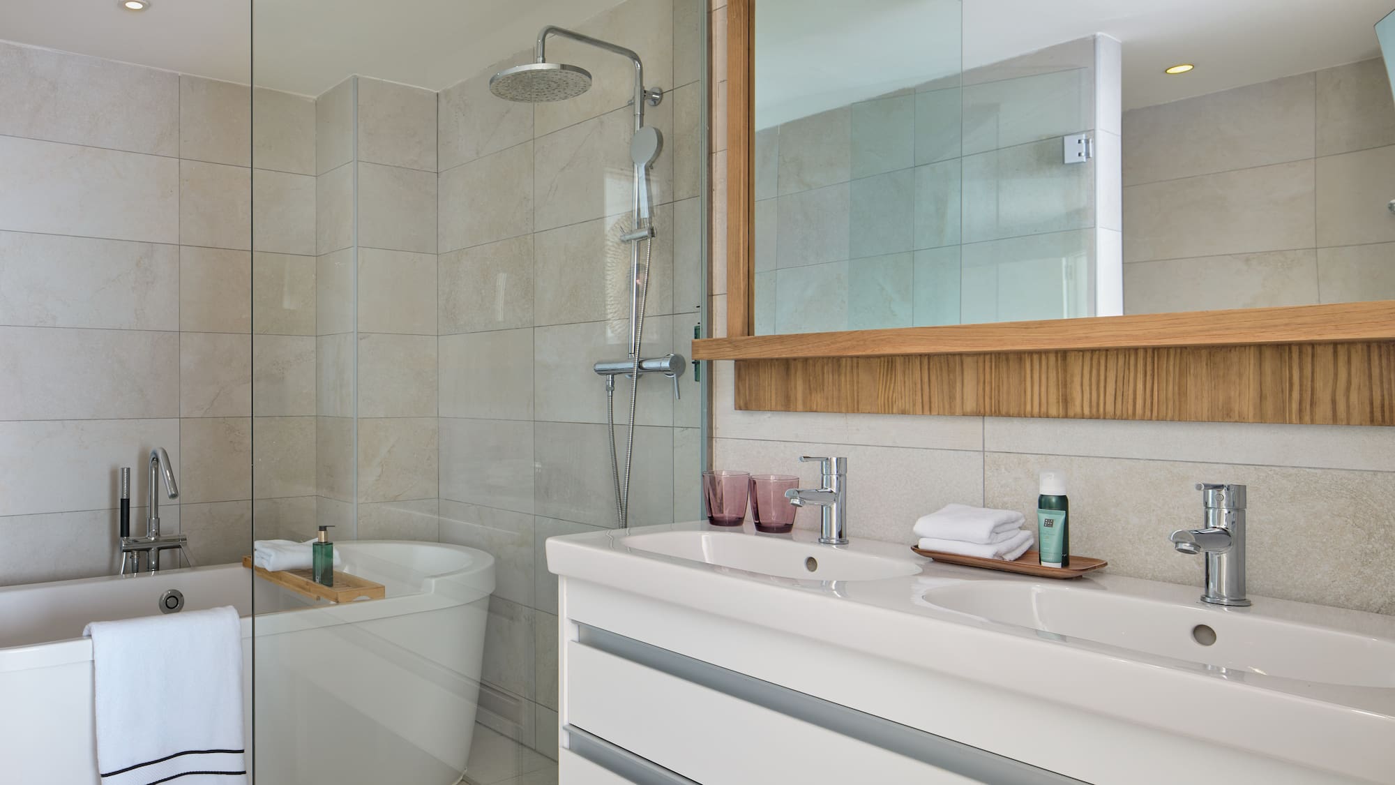 a bathroom with a shower and sink