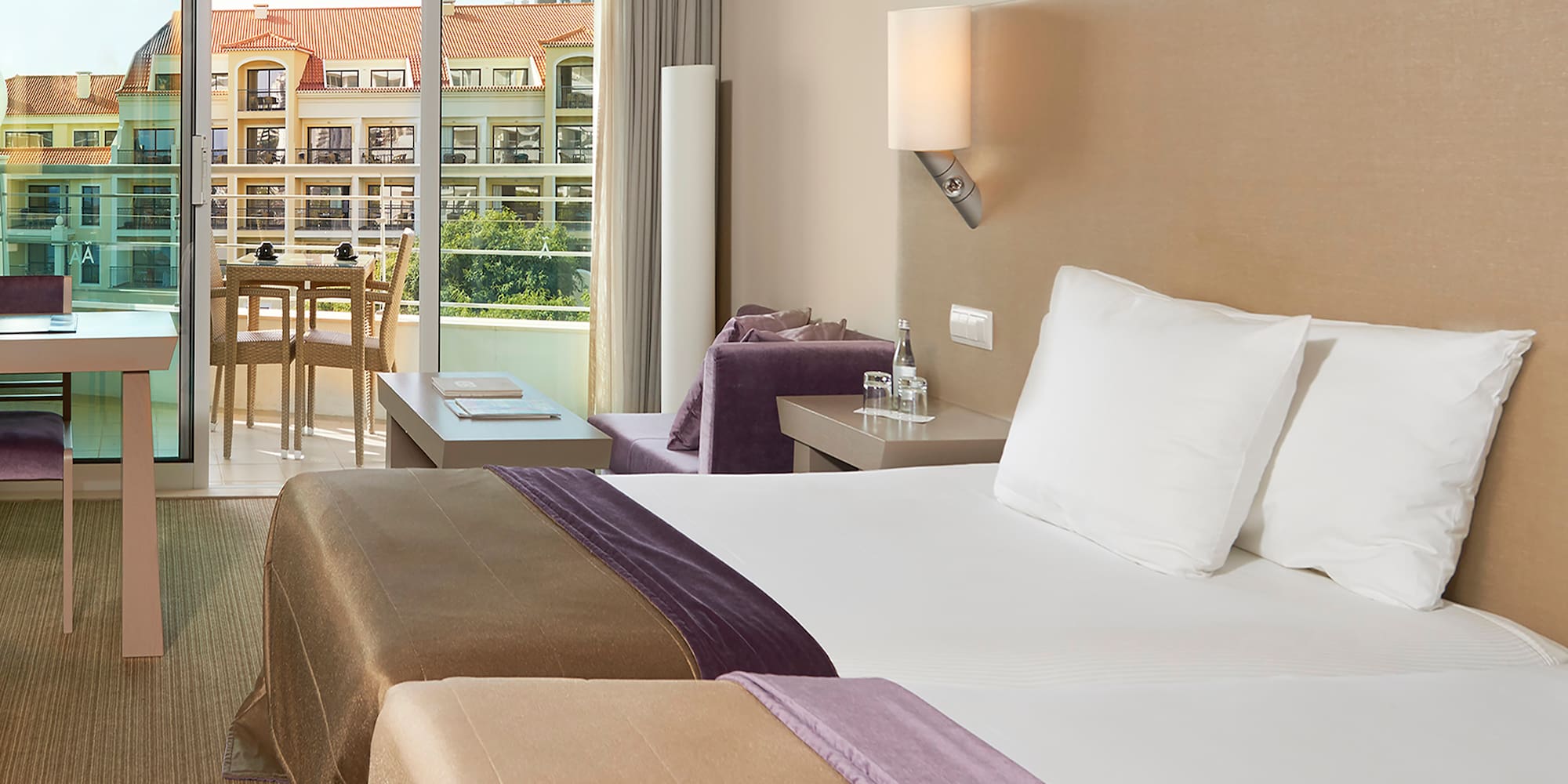 a hotel room with two beds