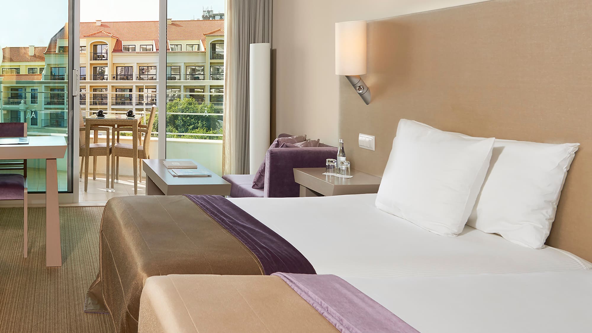 a hotel room with two beds