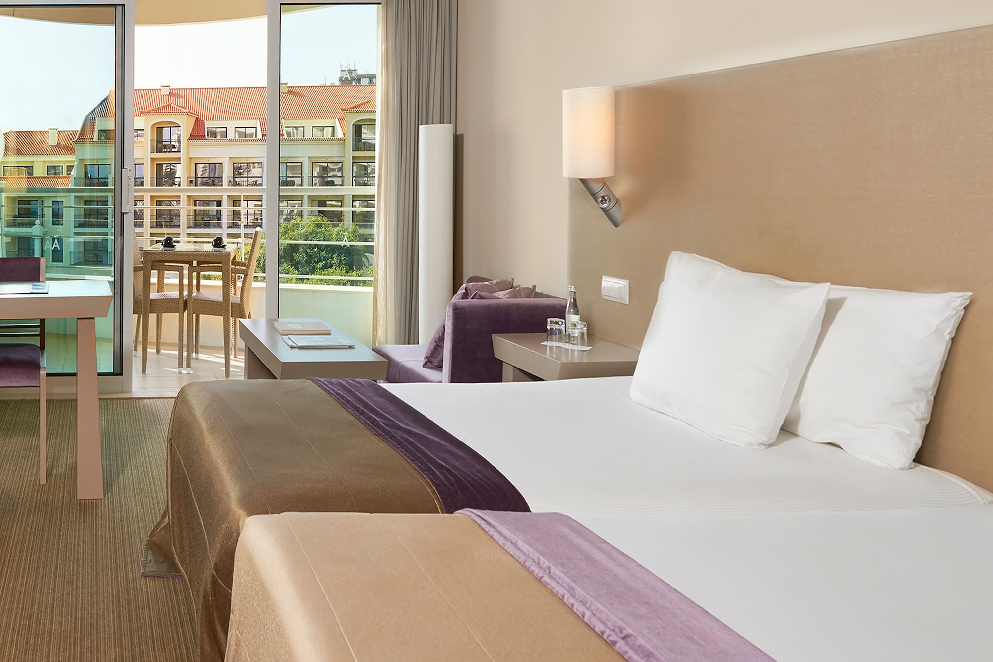 a hotel room with two beds