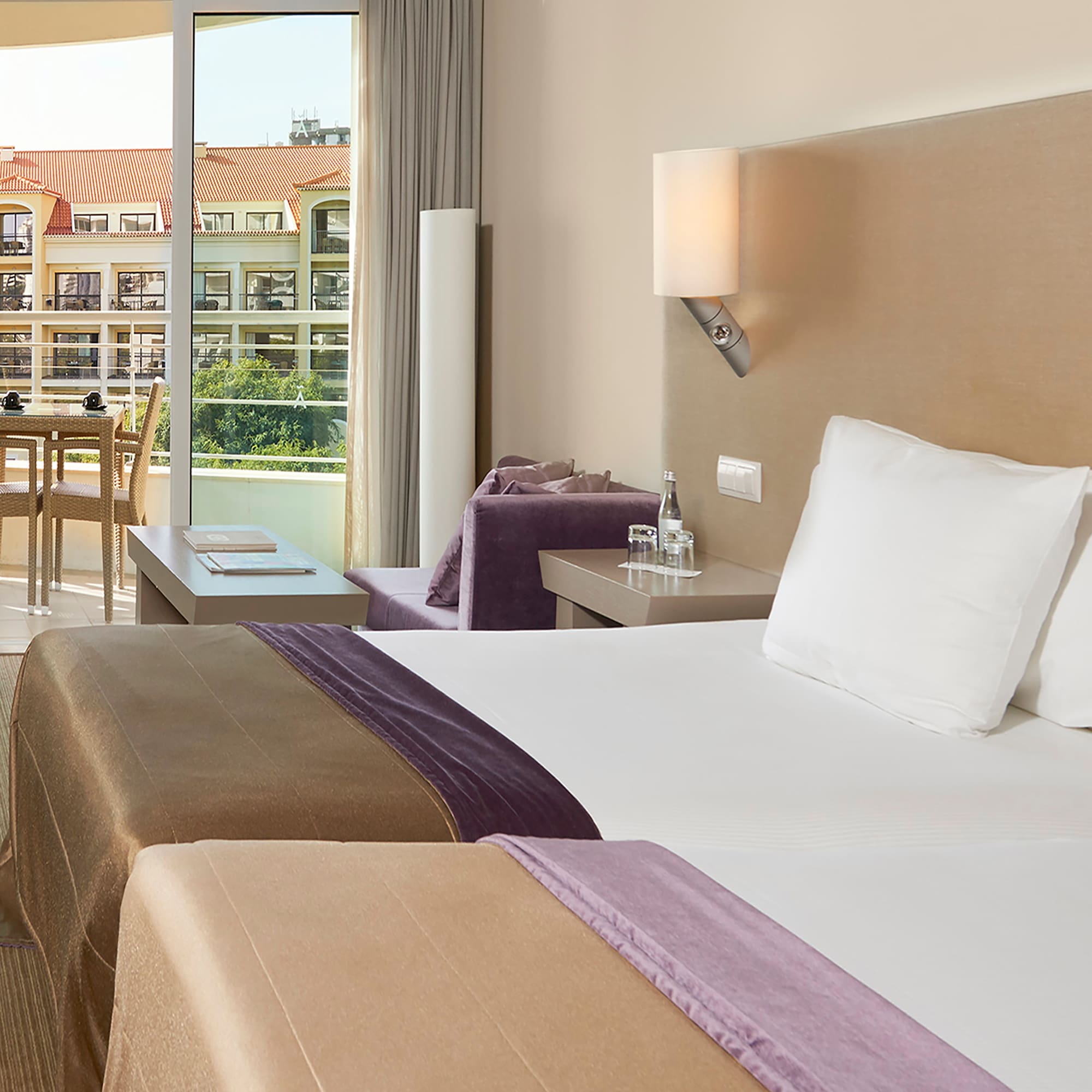 a hotel room with two beds