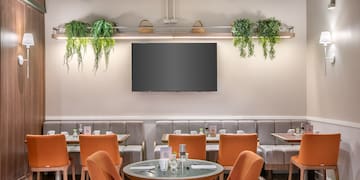 a room with tables and chairs