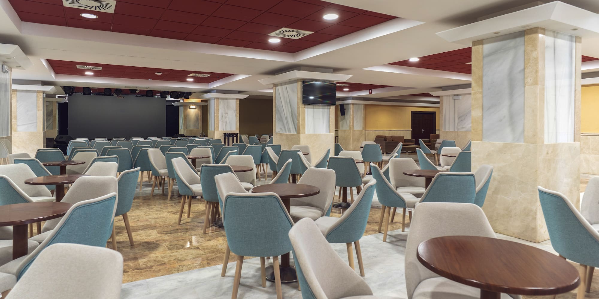 a room with tables and chairs