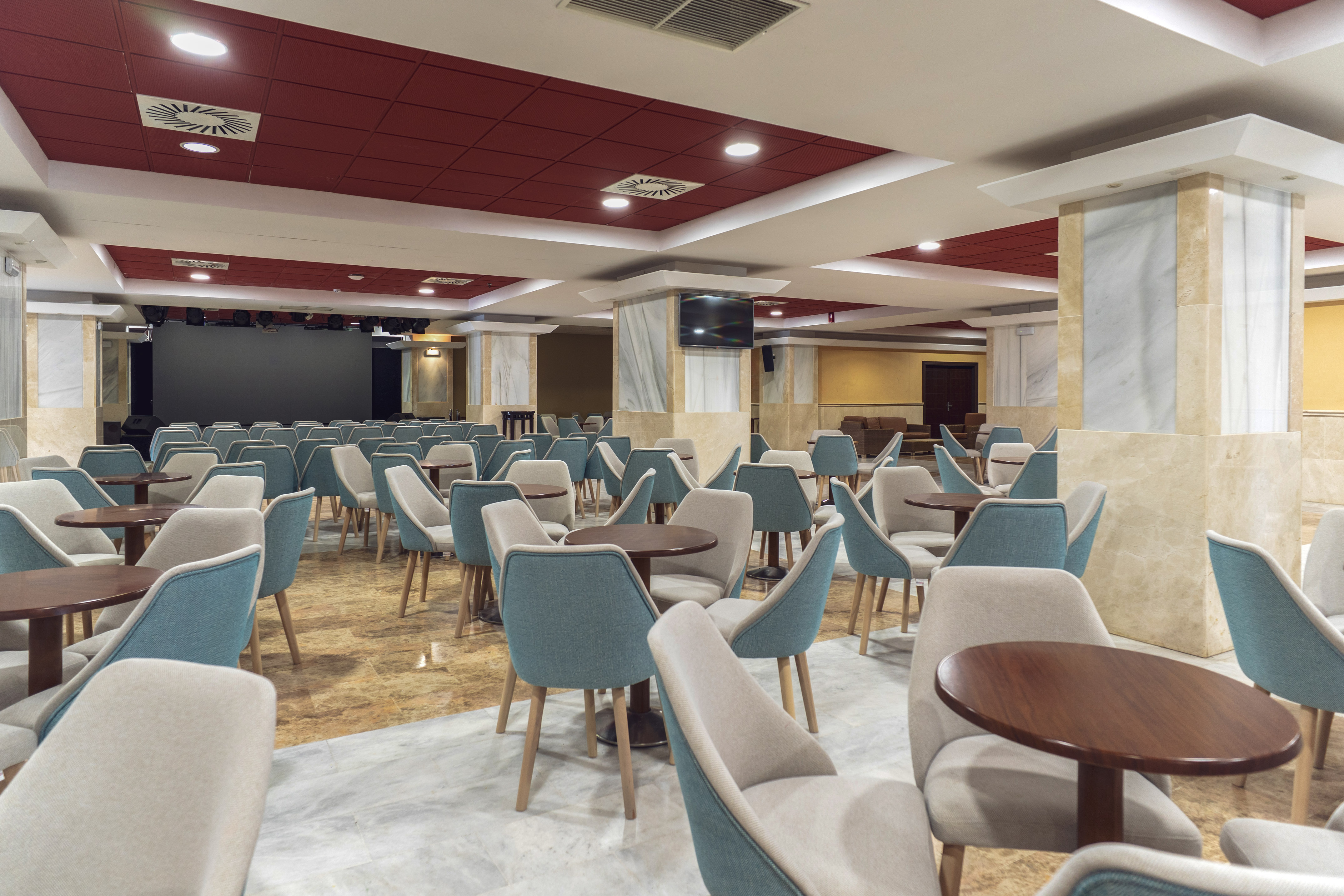 a room with tables and chairs