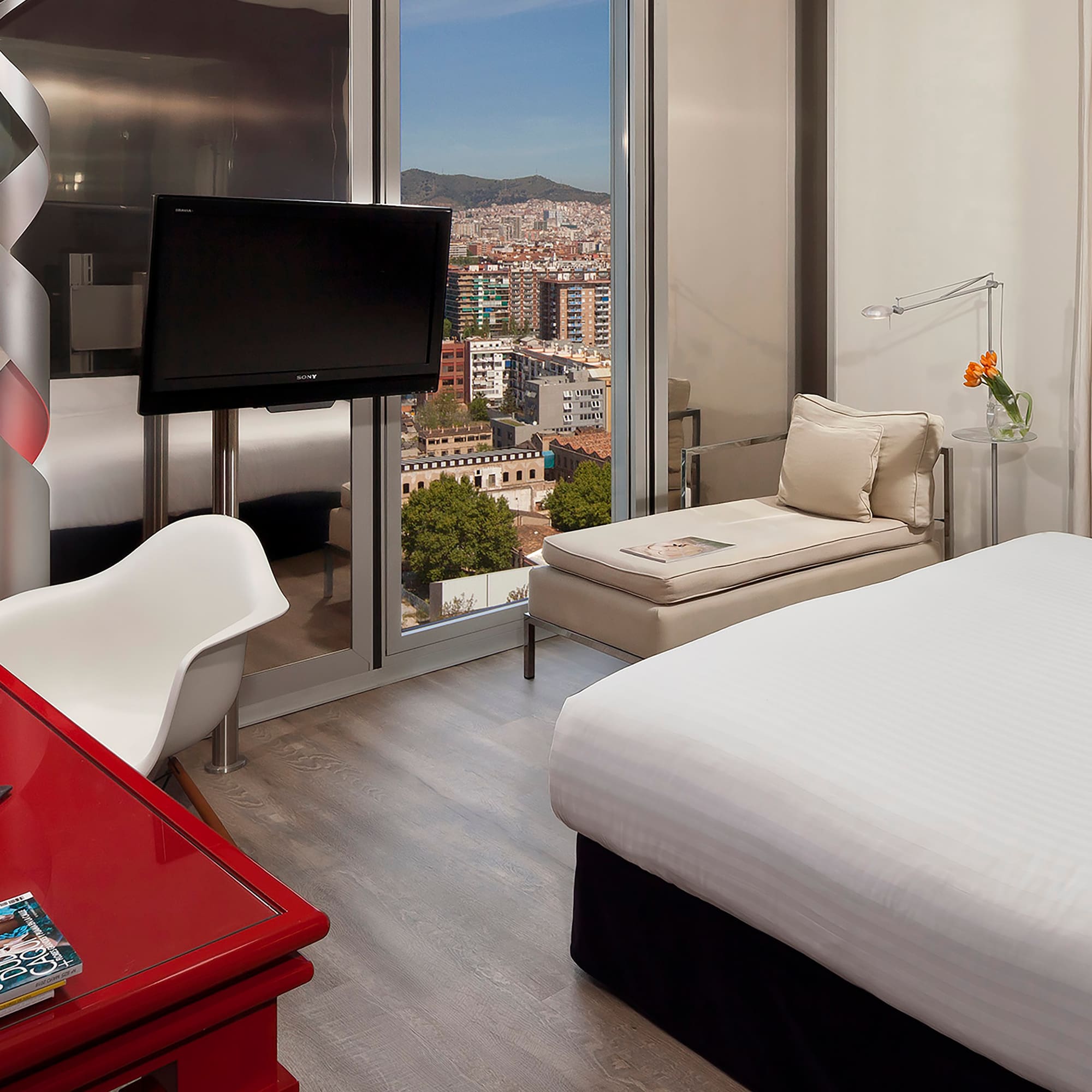 a room with a television and a table