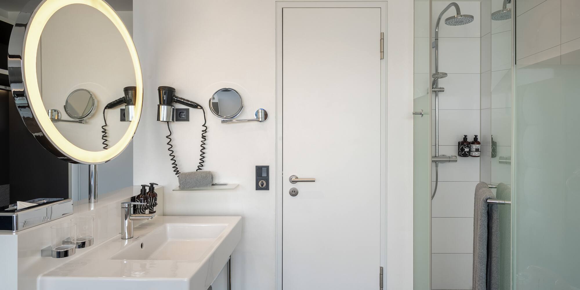 a bathroom with a mirror and sink