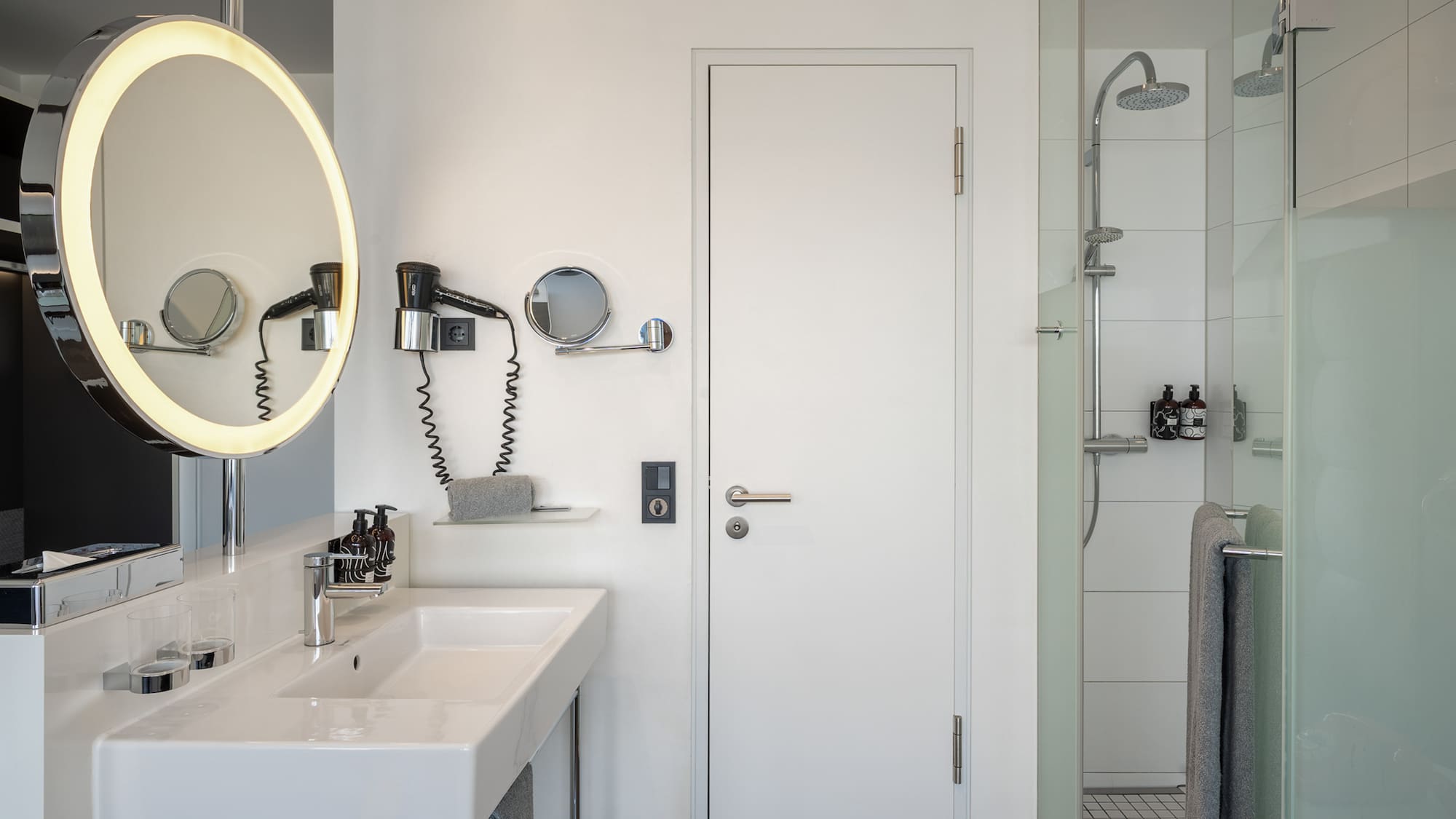 a bathroom with a mirror and sink